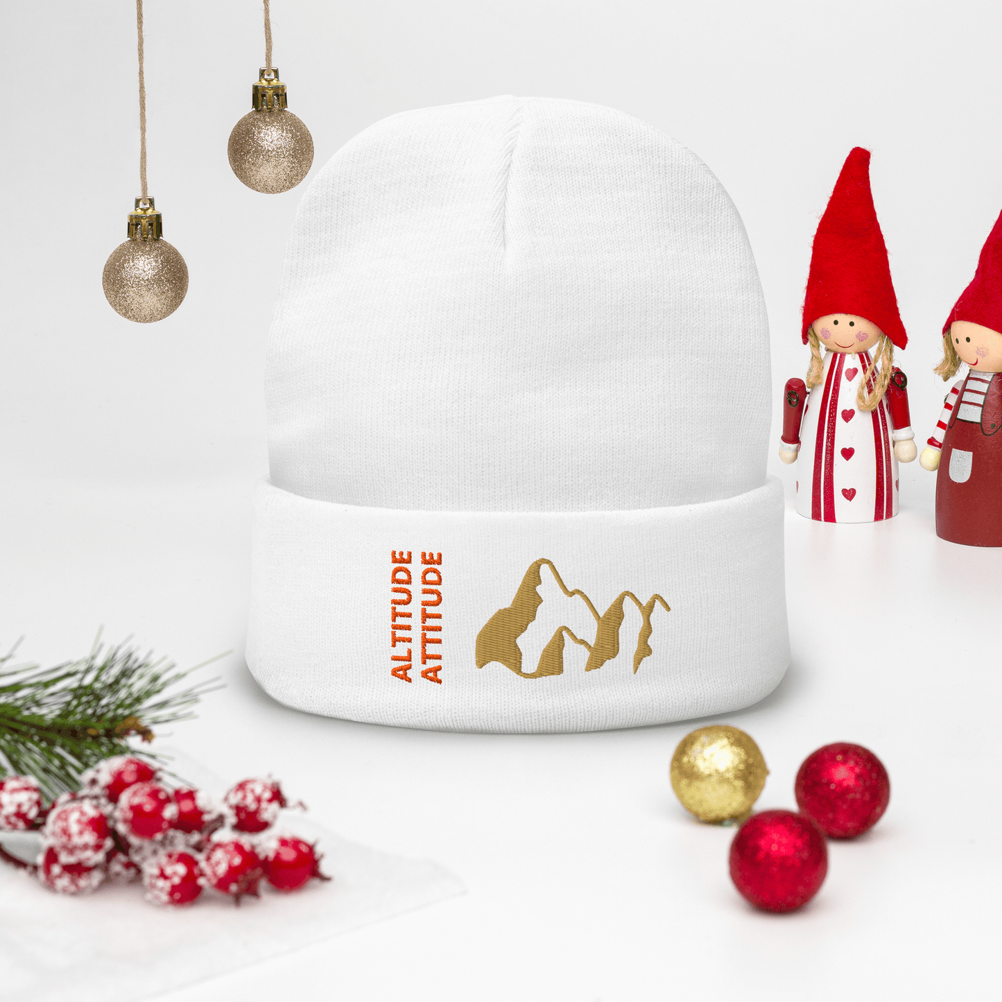 Mountain Beanie – Embroidered Knit Hat with Peak Style in white fabric with gold mountain design and cheerful decor.