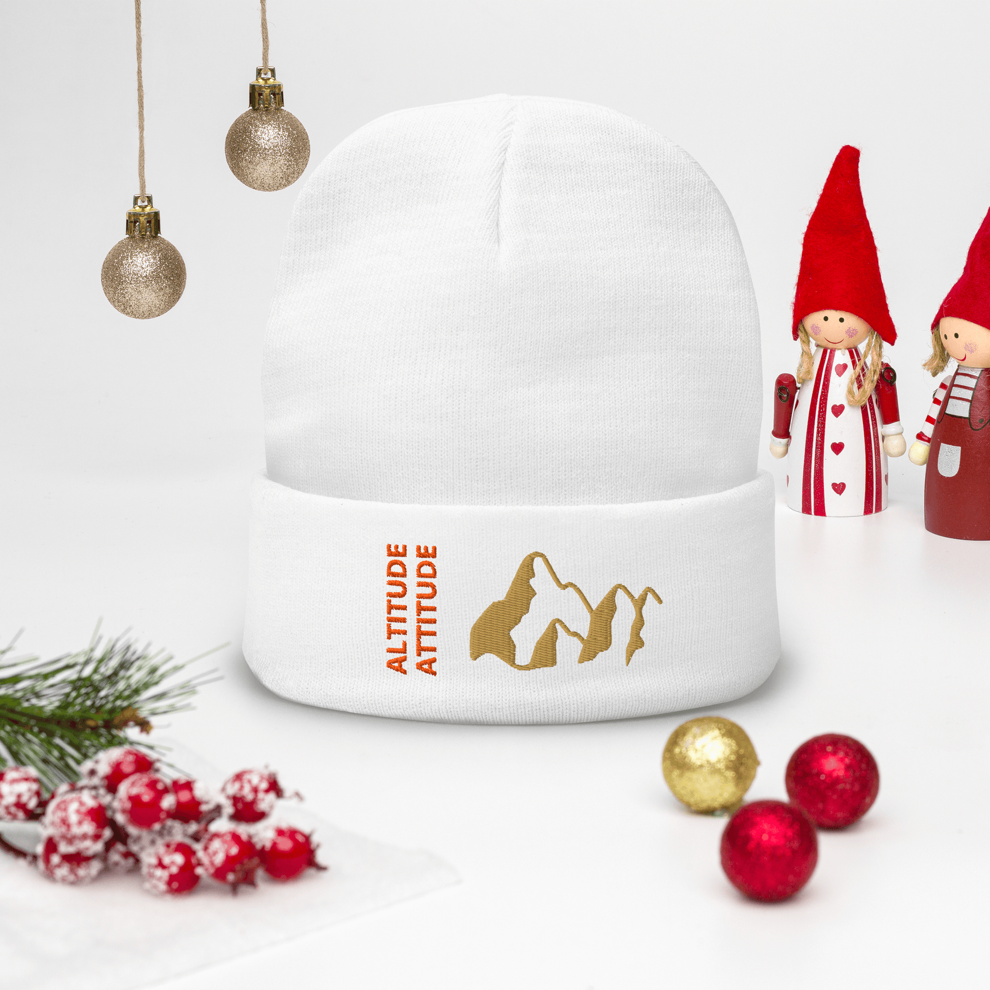 Mountain Beanie – Embroidered Knit Hat with Peak Style in white fabric with gold mountain design and cheerful decor.