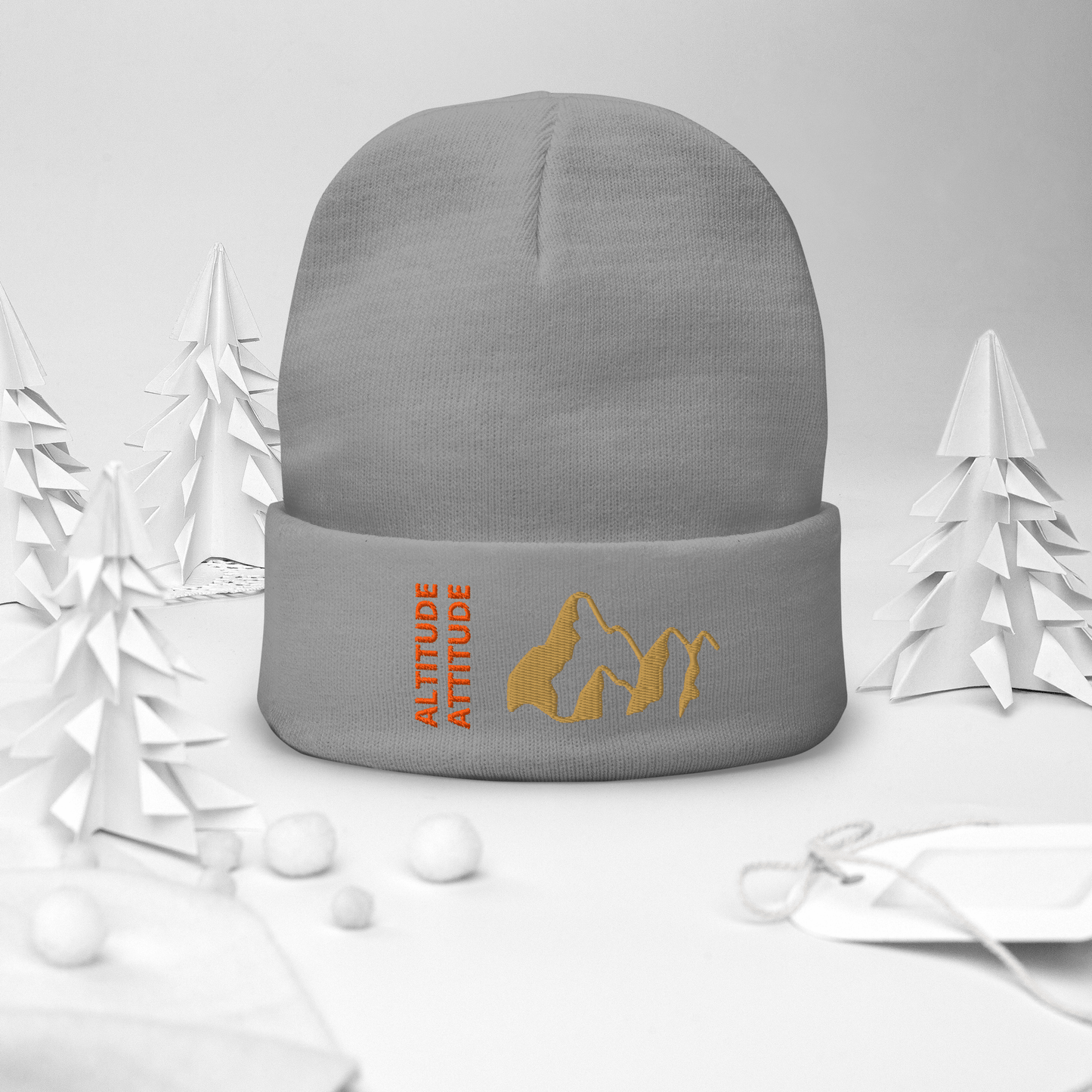 Mountain Beanie – Embroidered Knit Hat with Peak Style displayed with a cozy winter theme.