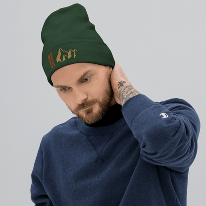 Mountain Beanie – Embroidered Knit Hat with Peak Style worn by a man with a stylish look.