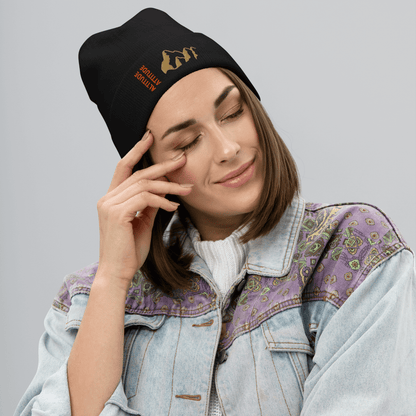 Mountain Beanie – Embroidered Knit Hat with Peak Style worn by a smiling woman in a denim jacket.