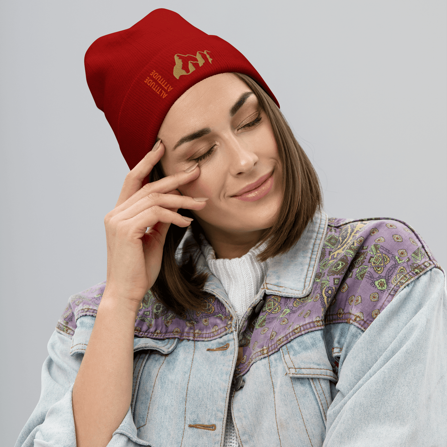 Mountain Beanie – Embroidered Knit Hat with Peak Style worn by a smiling woman in a denim jacket.