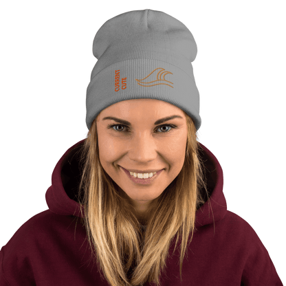 Ocean Waves Beanie – Embroidered Knit Hat with Custom Text modeled by a smiling woman in a gray beanie.