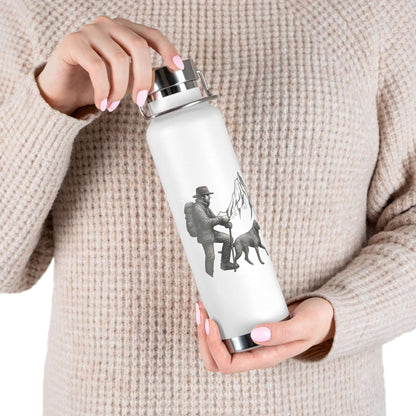 Personalized hiking bottle featuring a camper and dog design, perfect for outdoor adventures and keeping drinks insulated.