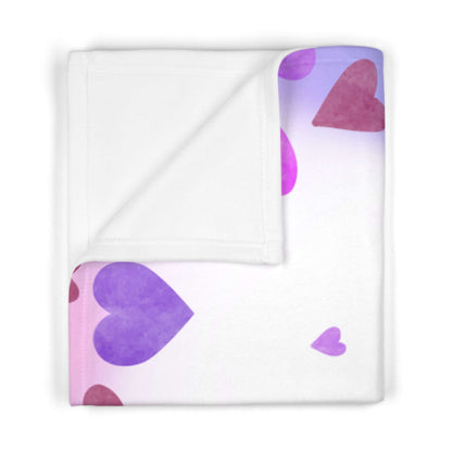 Personalized baby blanket with heart-themed design in pink and purple colors, soft fleece for cozy comfort.