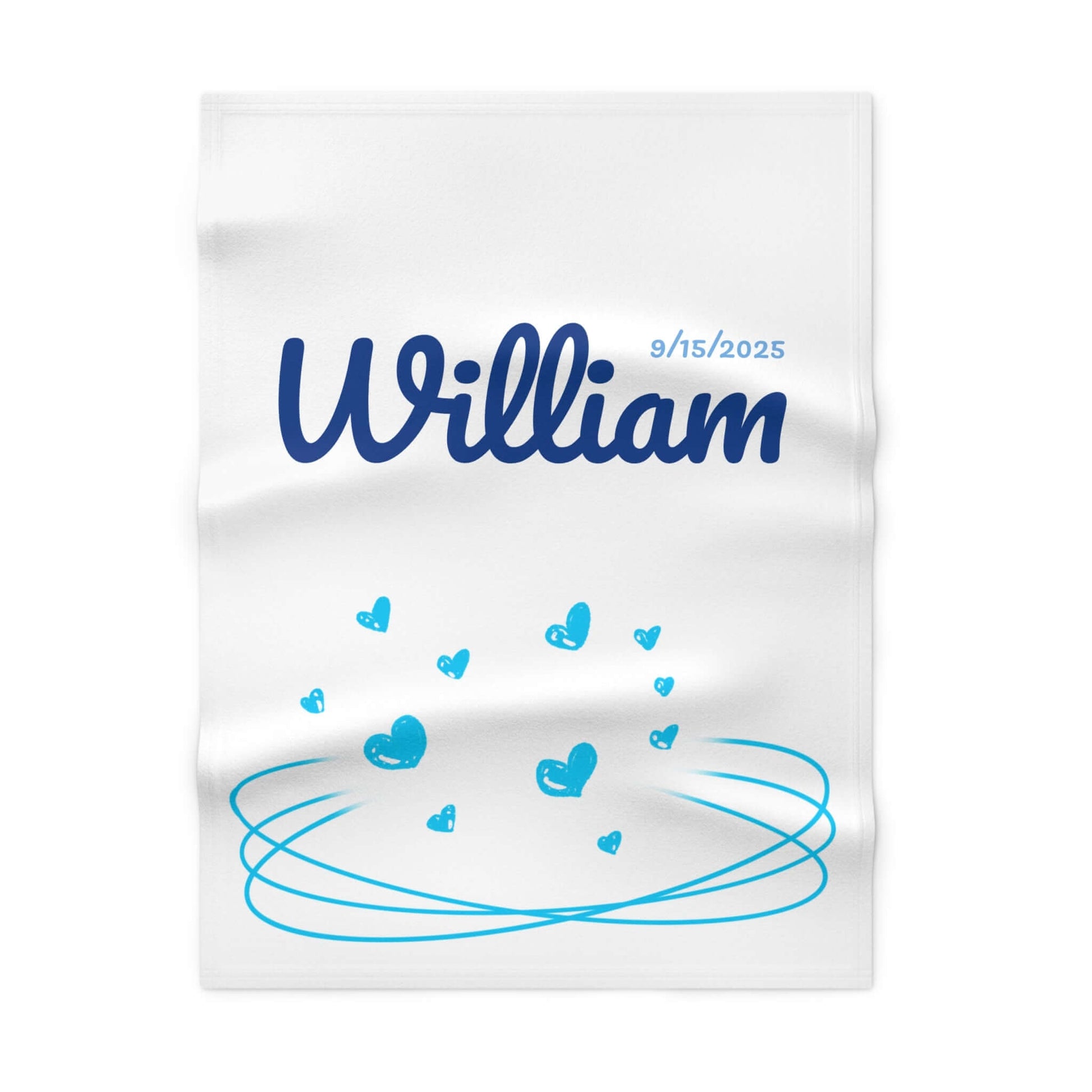 Personalized baby blanket with name William and date 9/15/2025, featuring a heart-themed design in blue.