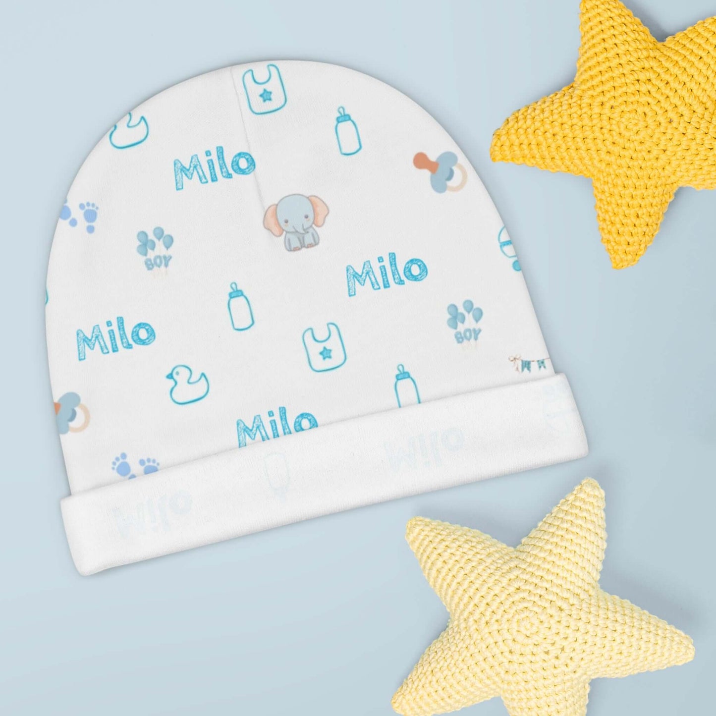 Personalized Baby Boy Beanie – Custom Name Infant Hat featuring baby motifs and blue text for custom name 'Milo'.