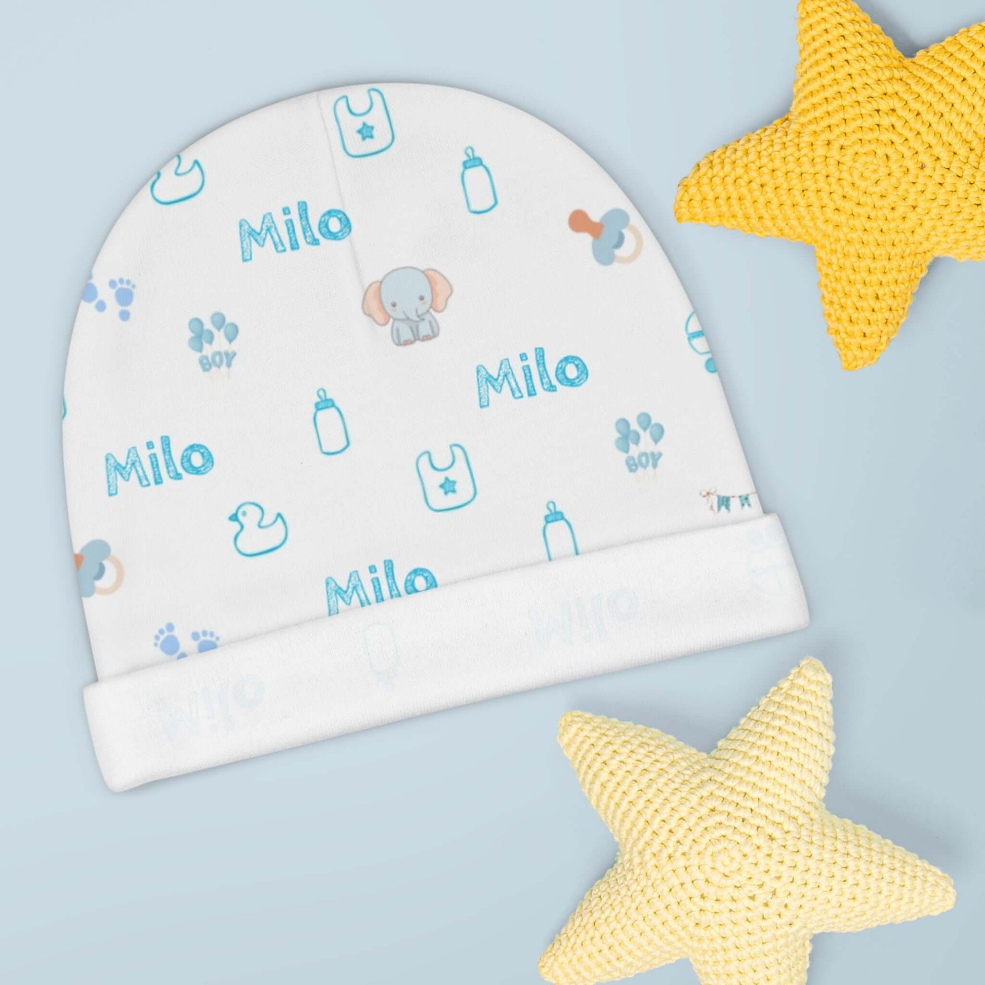 Personalized Baby Boy Beanie – Custom Name Infant Hat featuring baby motifs and blue text for custom name 'Milo'.