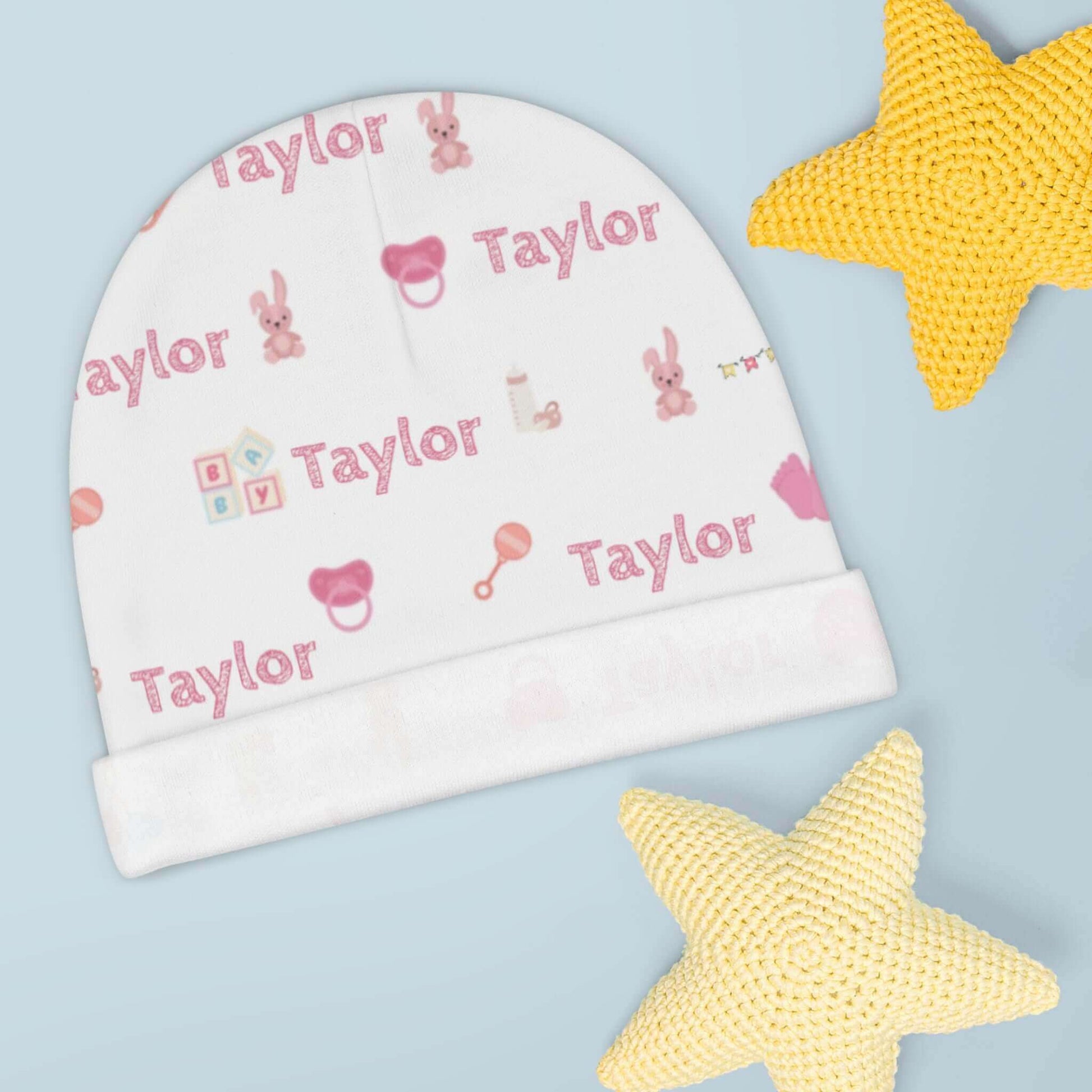 Personalized Baby Girl Beanie – Custom Infant Hat with Name & Icons featuring the name Taylor and nursery-themed designs.