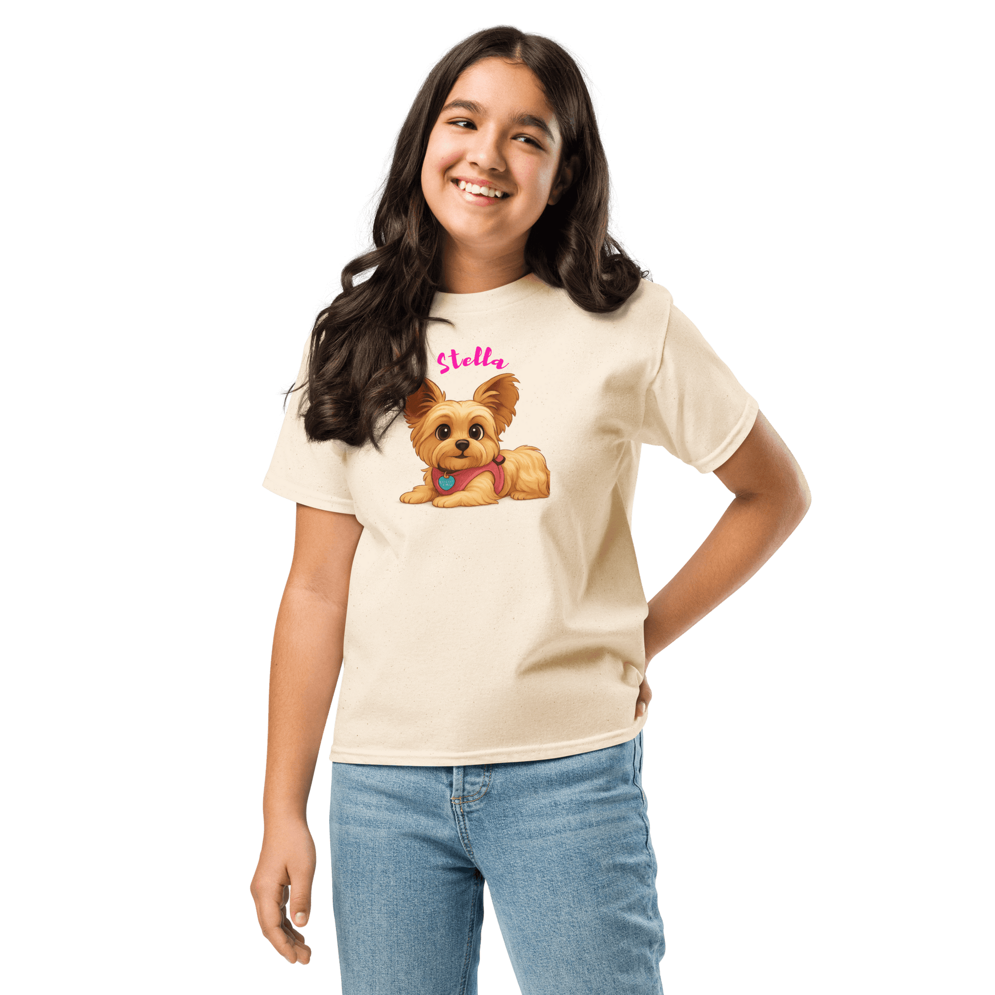 Personalized youth t-shirt featuring a cartoon dog illustration named Stella on a cream background.