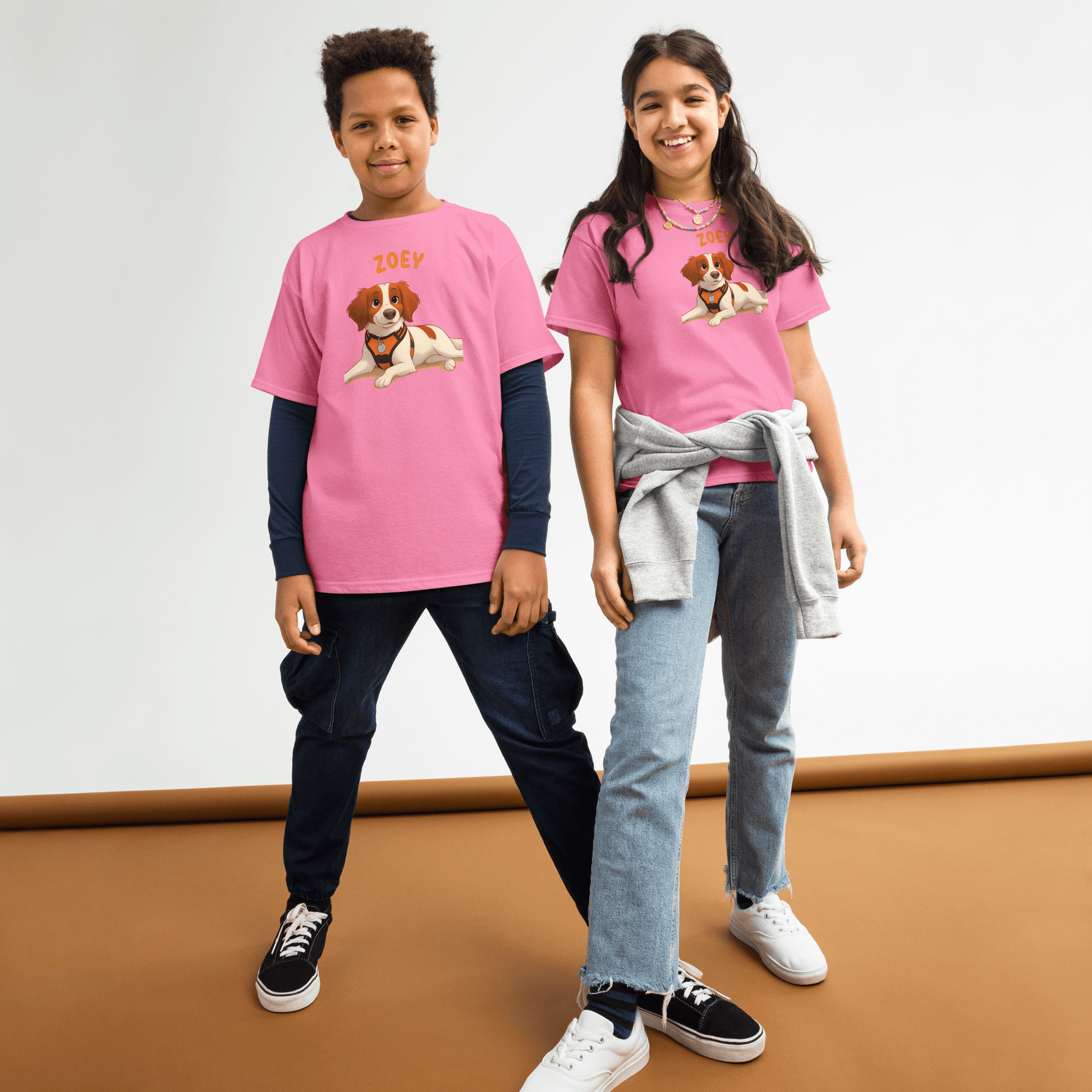Kids wearing personalized cartoon pet shirts featuring a dog, custom name 'Zoey' in playful font.