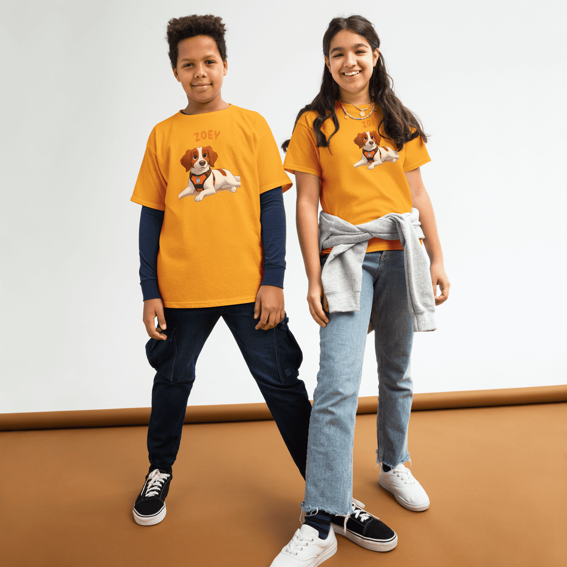 Kids wearing personalized cartoon pet shirts with a dog illustration and name 'Zoey' in an adventure-ready setting.