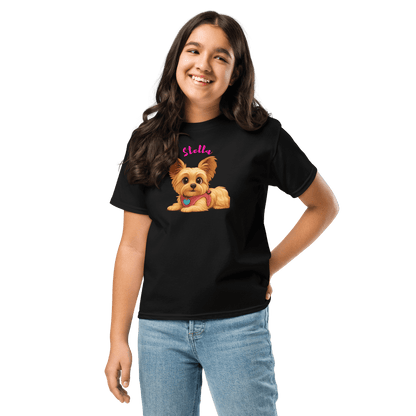 Youth wearing a personalized cartoon pet shirt featuring a cute dog illustration and custom name Stella.