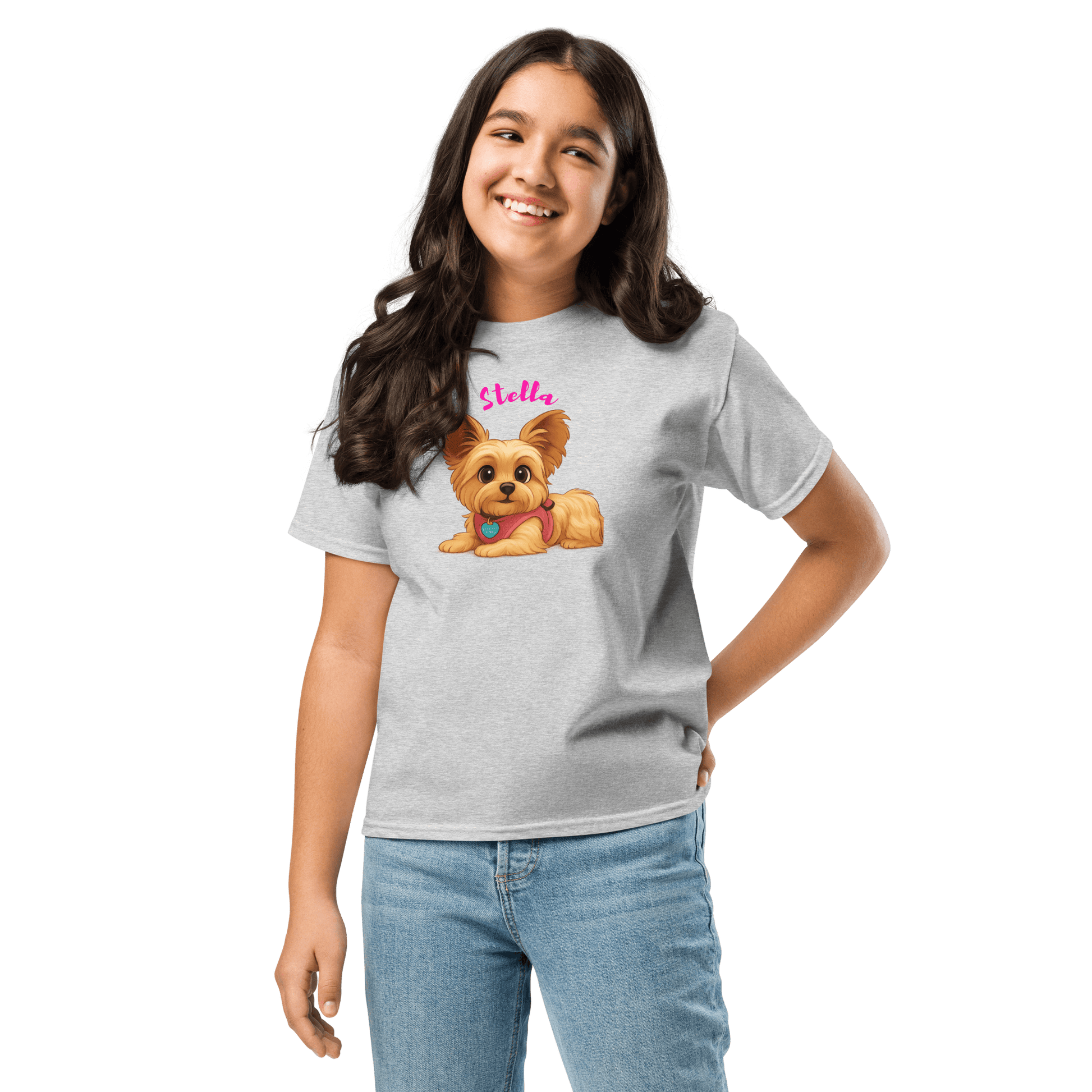 Cute girl wearing a personalized cartoon pet shirt featuring a dog illustration and custom name Stella.