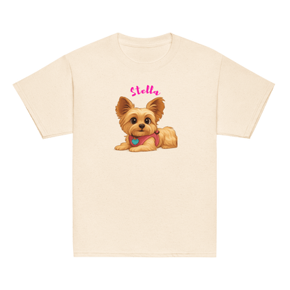 Personalized kids shirt featuring cartoon dog illustration named Stella on a soft youth tee.