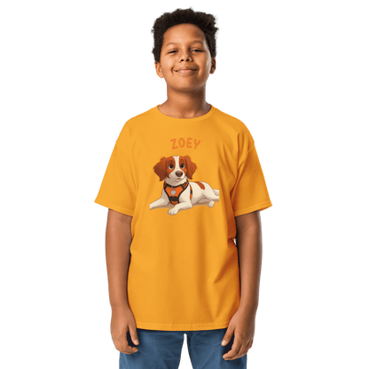Boy wearing a personalized cartoon pet shirt featuring a dog illustration and the name 'Zoey,' perfect for kids.