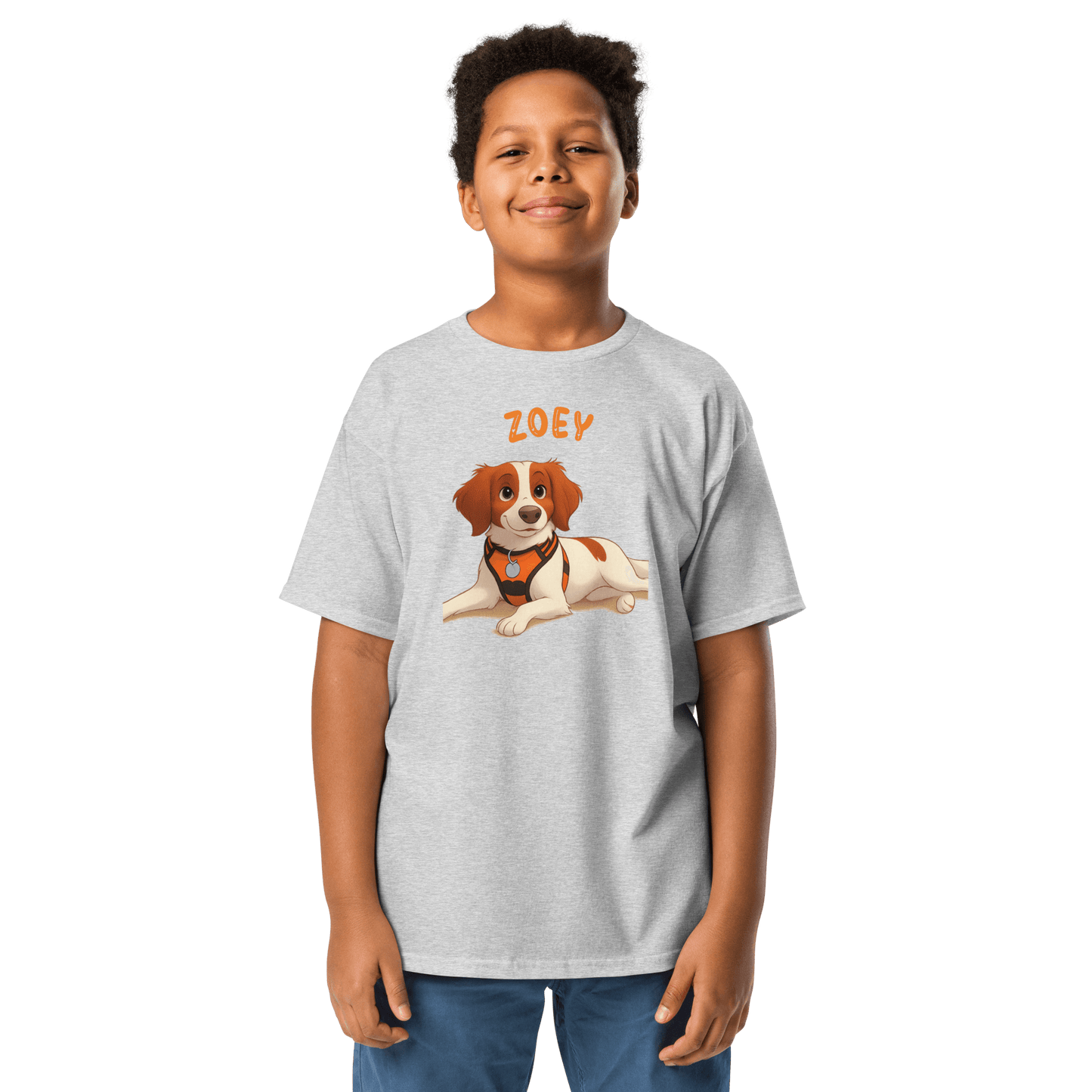 Kids personalized cartoon pet shirt featuring a boy wearing a tee with a dog illustration and the name Zoey.