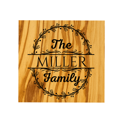 Personalized Home Warming Gift Basket with Engraved Cutting Board featuring 'The MILLER Family' design.
