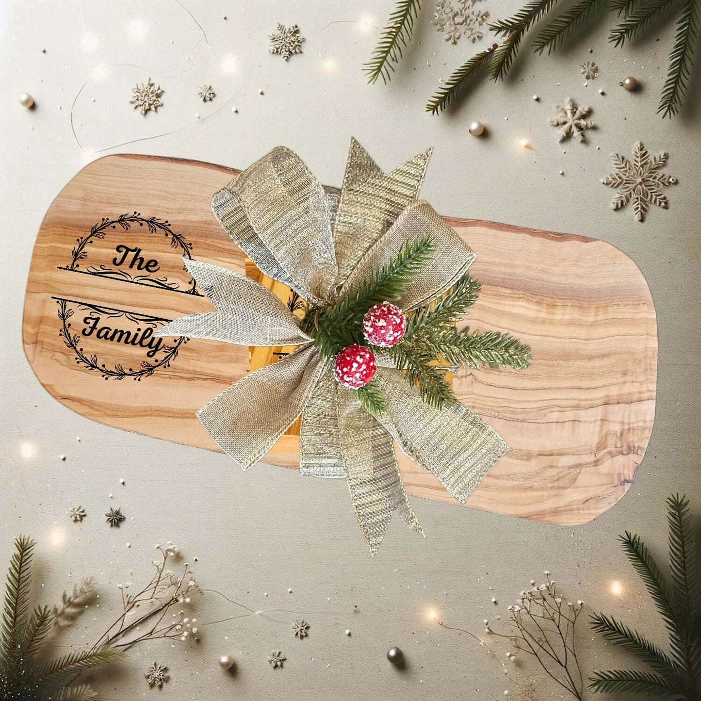 Personalized Family Name Gift – Olive Wood Set with bow and festive decorations on a light background.