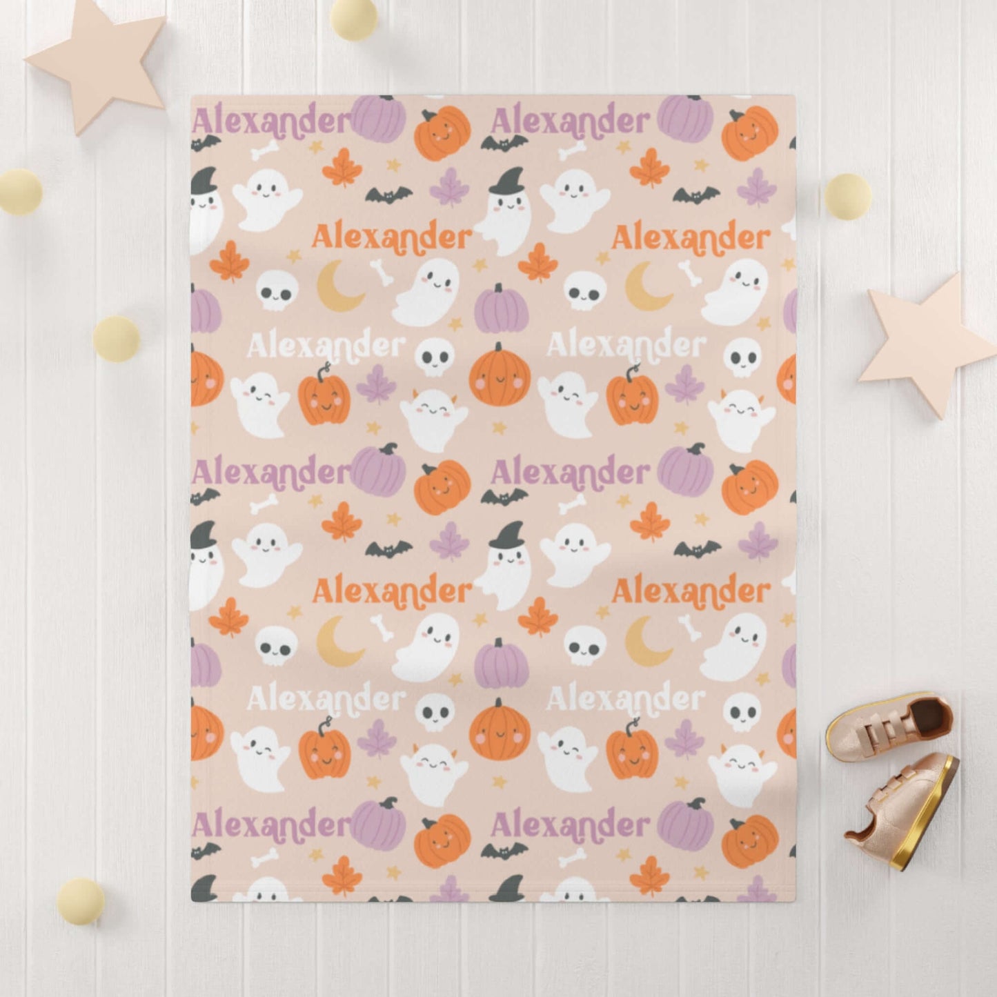 Personalized Halloween Baby Blanket – Ghost Parade Your Little Boo’s featuring ghosts, pumpkins, and leaves in warm colors.