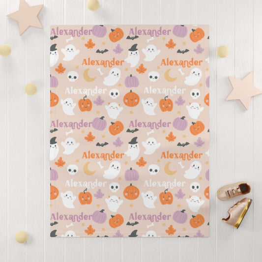 Personalized Halloween Baby Blanket – Ghost Parade Your Little Boo’s featuring ghosts, pumpkins, and leaves in warm colors.