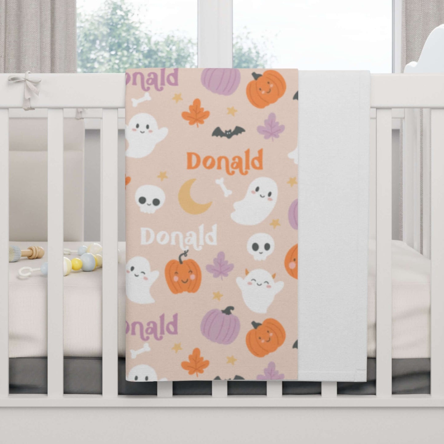Personalized Halloween Baby Blanket – Ghost Parade Your Little Boo’s featuring ghosts, pumpkins, and bats on a cozy fleece.