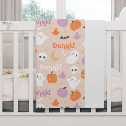 Personalized Halloween Baby Blanket – Ghost Parade Your Little Boo’s featuring ghosts, pumpkins, and bats on a cozy fleece.