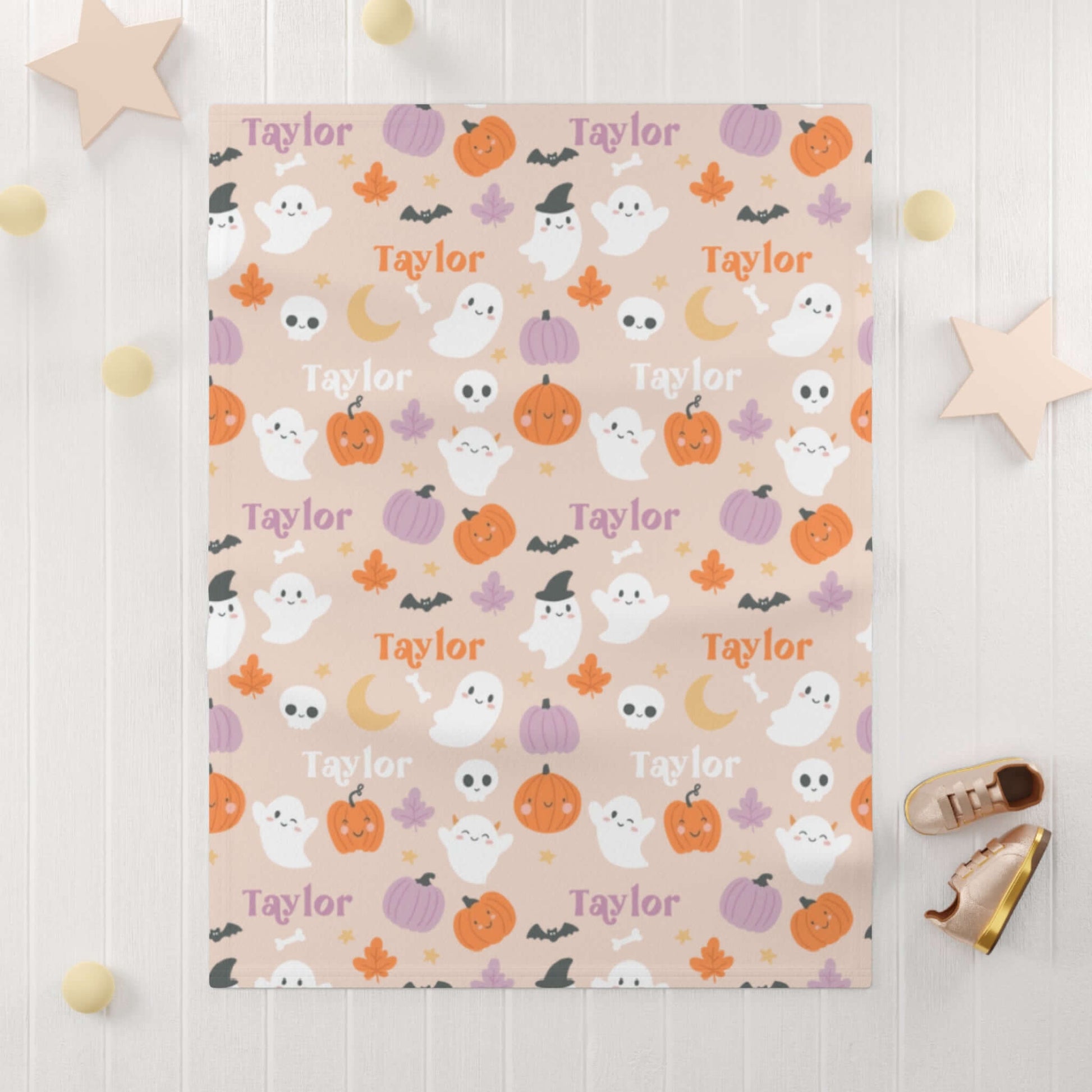 Personalized Halloween Baby Blanket – Ghost Parade Your Little Boo’s featuring playful ghosts and pumpkins with name Taylor.