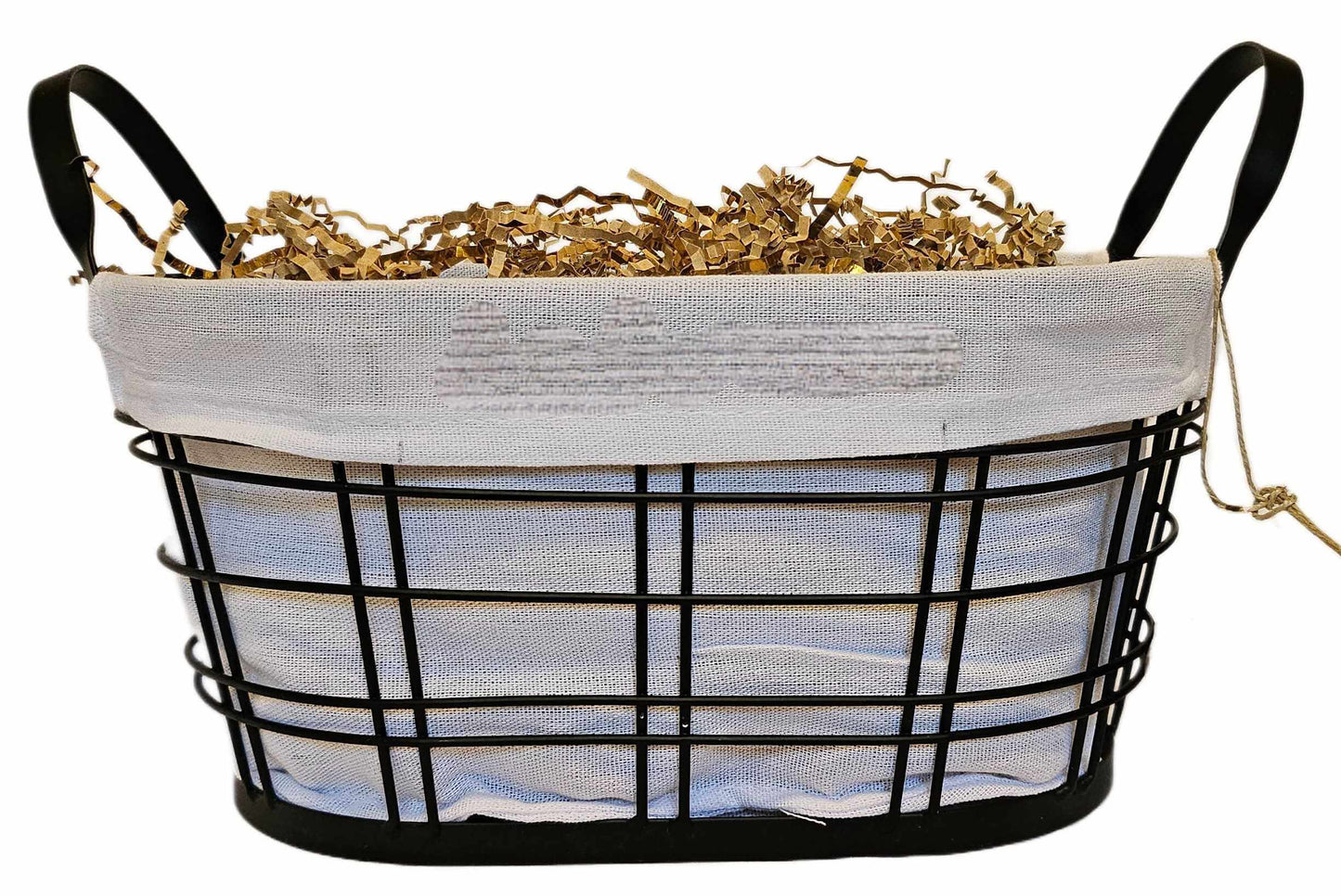 Personalized Home Warming Gift Basket with Engraved Cutting Board in a black wire frame with white cloth.