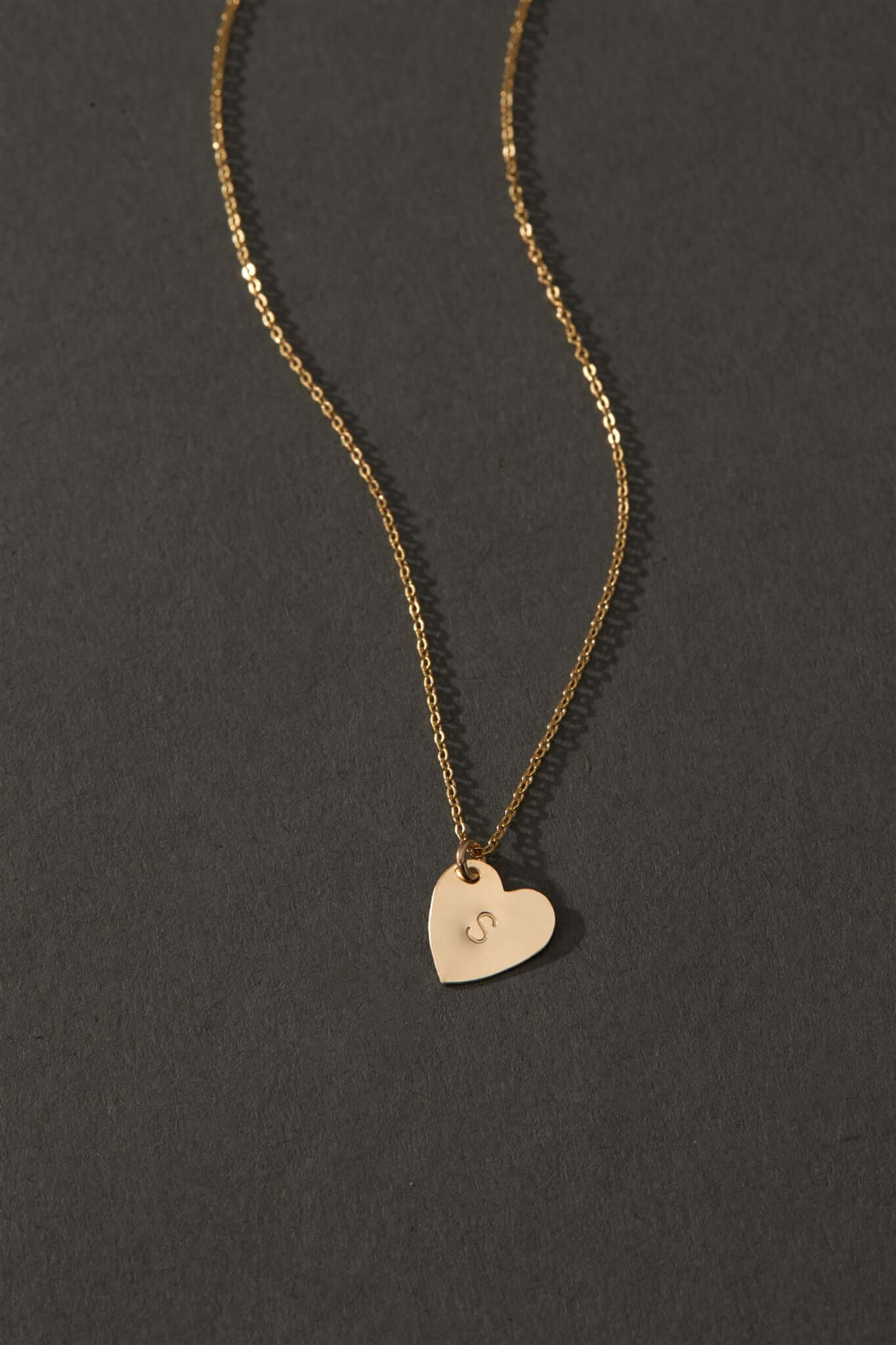 The First Layer – Personalized Sophia Initial Necklace in 14k Gold-Filled featuring a heart pendant with an initial.