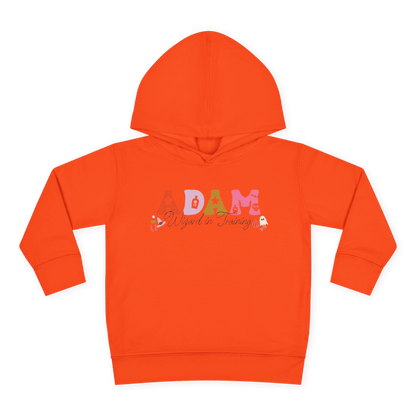 Spooky Toddler Hoodie – Personalized Halloween Pullover for Your Little Boo in orange with name Adam.