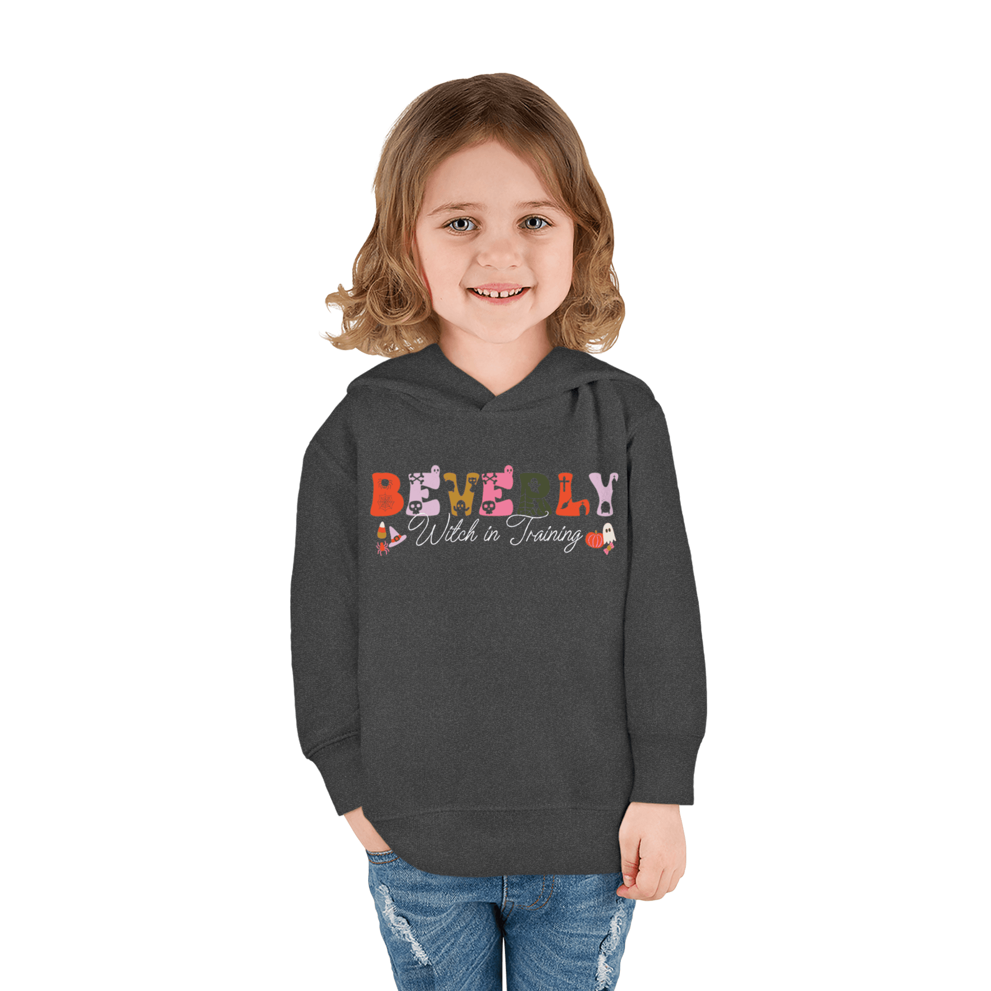 Spooky Toddler Hoodie – Personalized Halloween Pullover for Your Little Boo featuring a cute child wearing a custom hoodie.