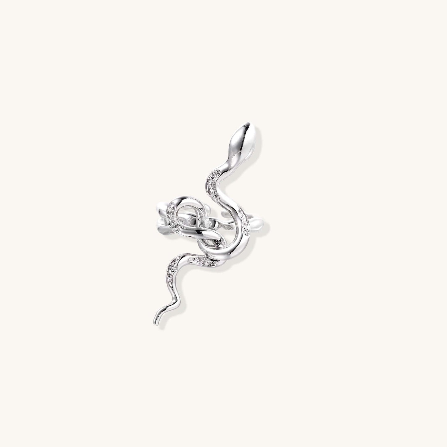 Serpent Flow Ring featuring a sculptural snake design with sparkling crystal accents.