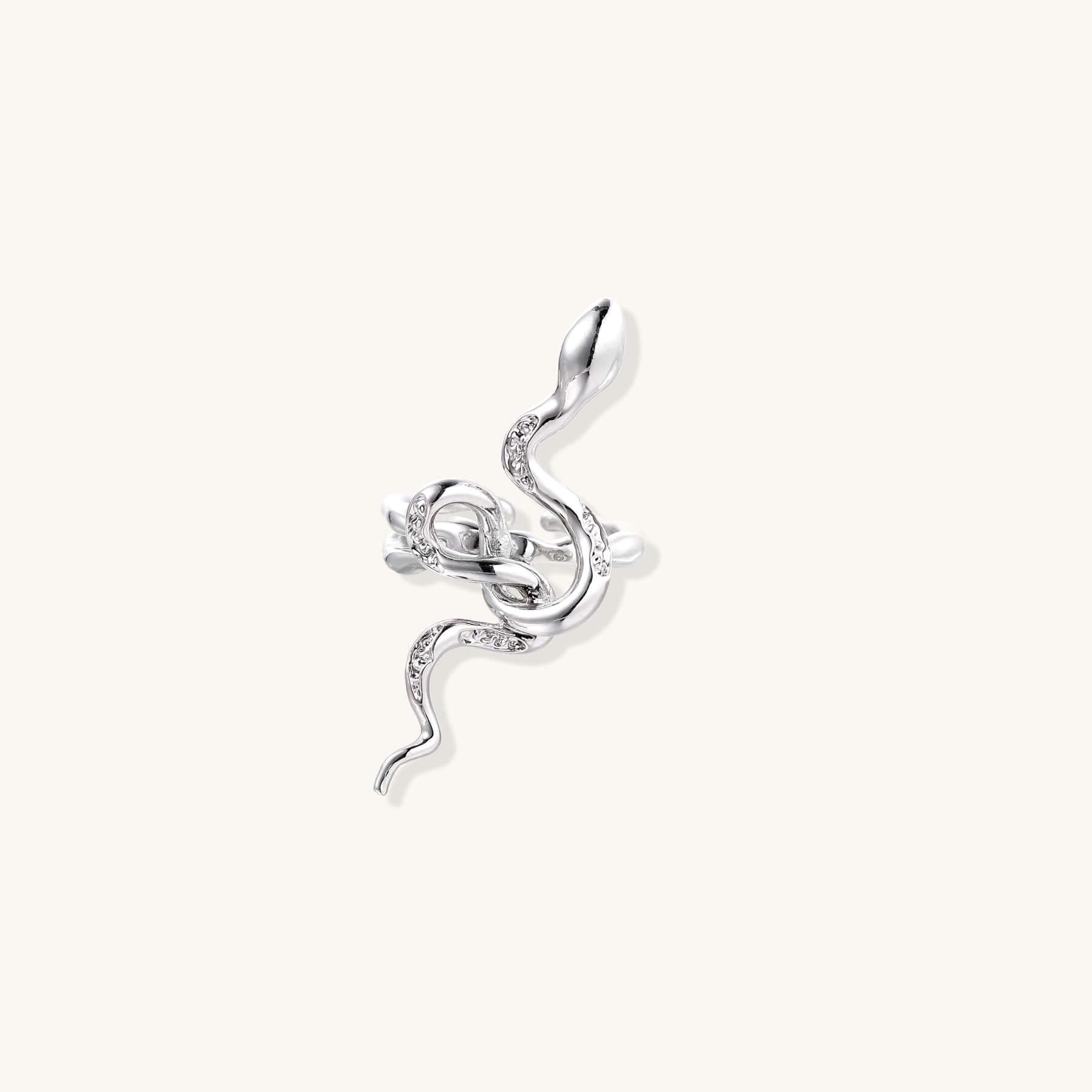 Serpent Flow Ring featuring a sculptural snake design with sparkling crystal accents.