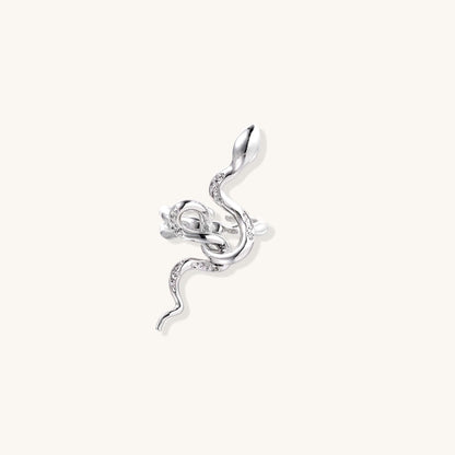 Serpent Flow Ring featuring a sculptural snake design with sparkling crystal accents.