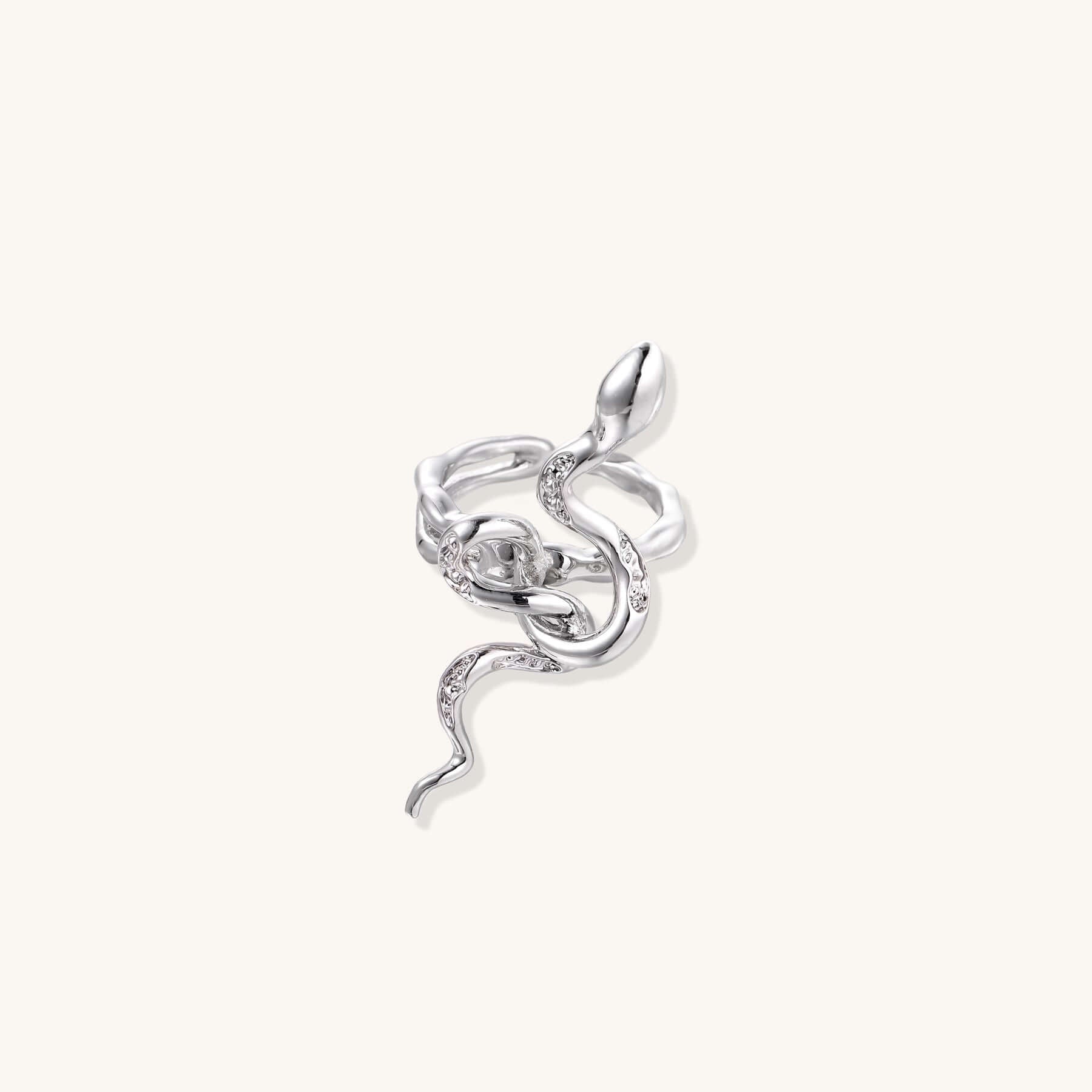 Elegant Serpent Flow Ring featuring a sculptural silver design with sparkling crystal accents.