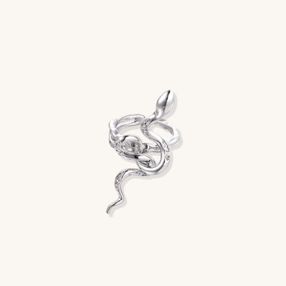 Elegant Serpent Flow Ring featuring a sculptural silver design with sparkling crystal accents.