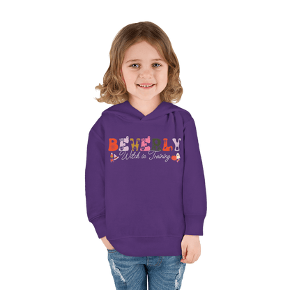 Spooky Toddler Hoodie – Personalized Halloween Pullover for Your Little Boo featuring a child wearing a purple hoodie.