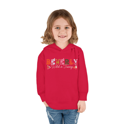 Spooky Toddler Hoodie – Personalized Halloween Pullover for Your Little Boo with name Beverly and Witch in Training.