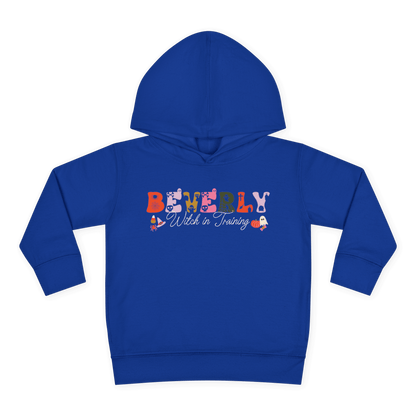 Spooky Toddler Hoodie – Personalized Halloween Pullover for Your Little Boo featuring name Beverly, Witch in Training design.