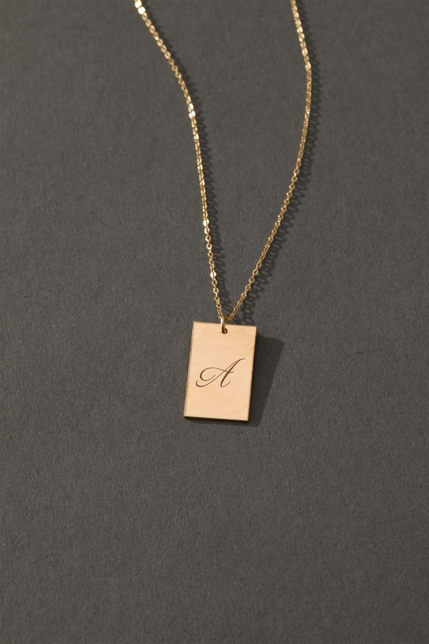 Stella Gold Initial Necklace – Personalized 14k Gold-Filled Pendant featuring a delicate engraved pendant with letter A.