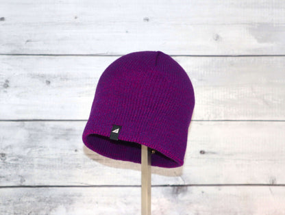Toddler Acrylic Beanie – Soft Stretch Hat for Ages 1–3 in vibrant purple color displayed on a stand.