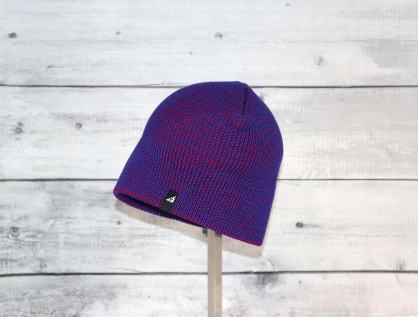 Toddler Acrylic Beanie – Soft Stretch Hat for Ages 1–3 in vibrant purple and blue colors, perfect for chilly weather.