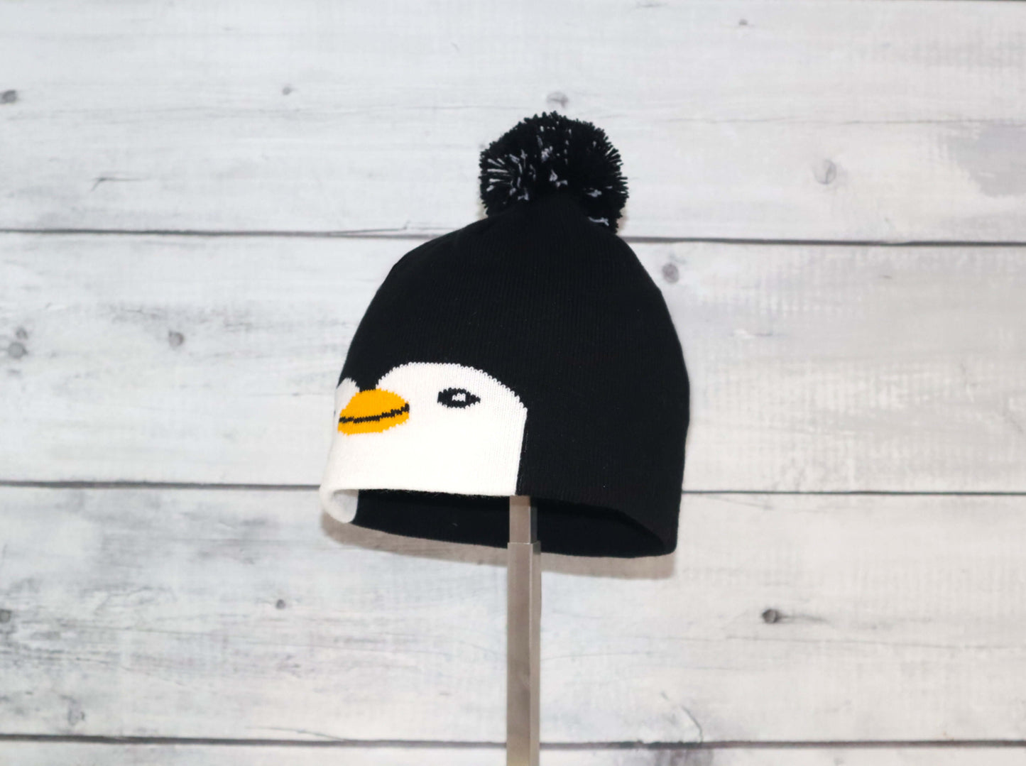 Toddler Specialty Hat – Animal-Inspired Warmth with Purpose featuring a cute penguin design