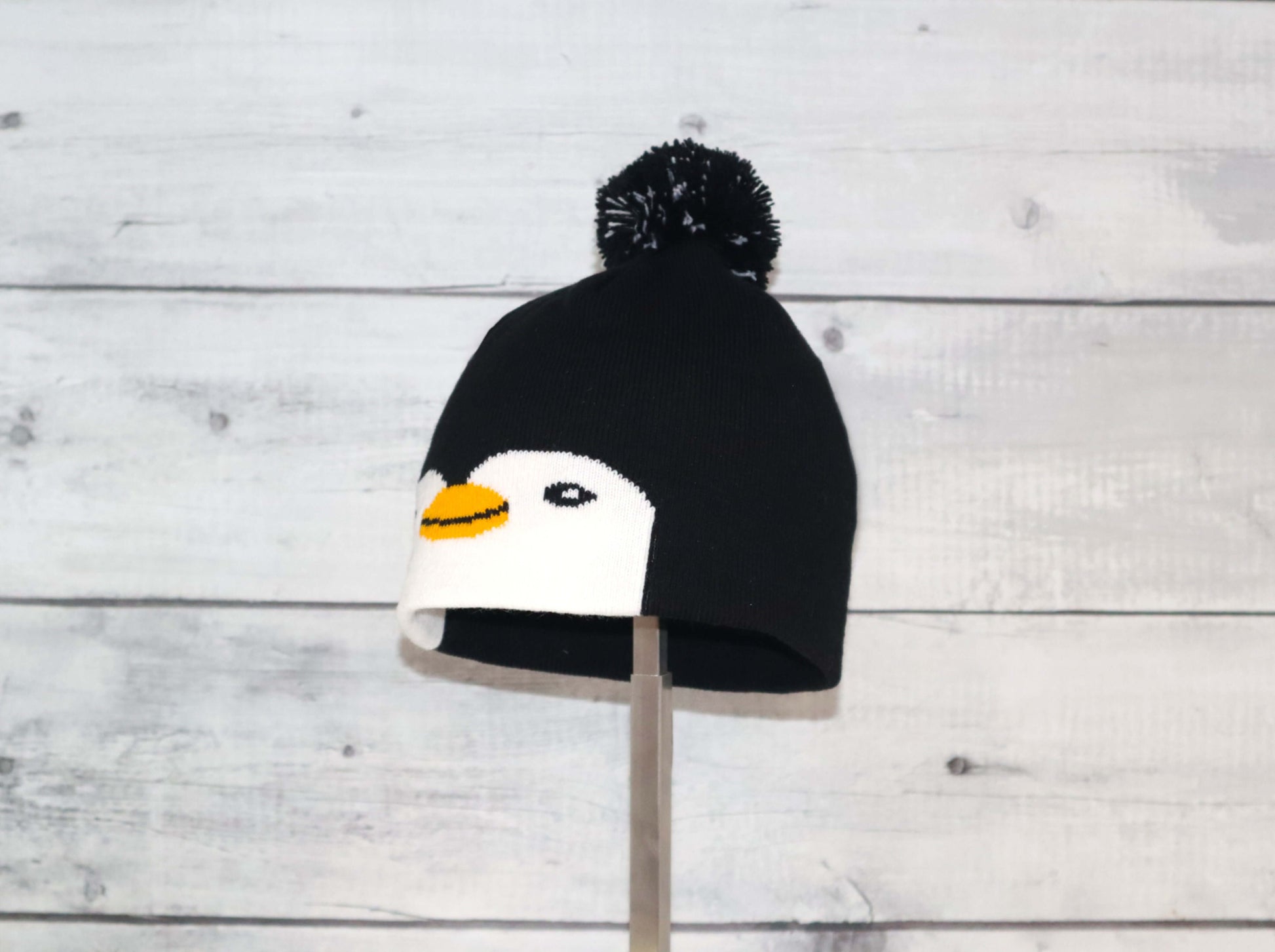 Toddler Specialty Hat – Animal-Inspired Warmth with Purpose featuring a cute penguin design