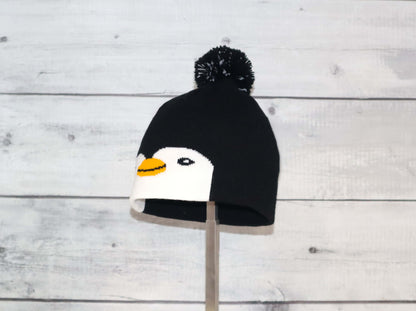 Toddler Specialty Hat – Animal-Inspired Warmth with Purpose featuring a cute penguin design