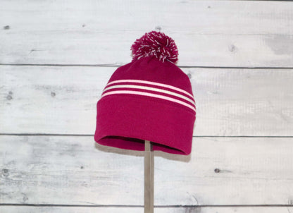 Toddler Specialty Hat – Animal-Inspired Warmth with Purpose in vibrant pink with pom-pom.