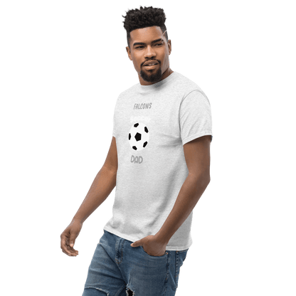 Man wearing a light gray soccer dad tee featuring a soccer ball graphic and text for Falcons supporters.