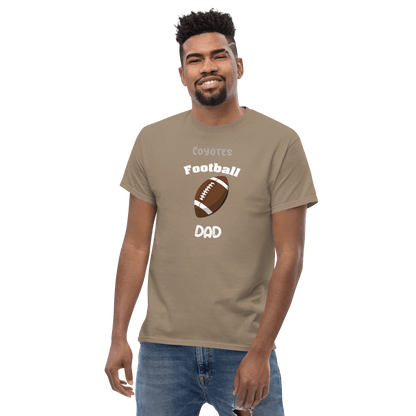 Personalized football dad tee featuring a brown football graphic and 'Coyotes Football Dad' text.