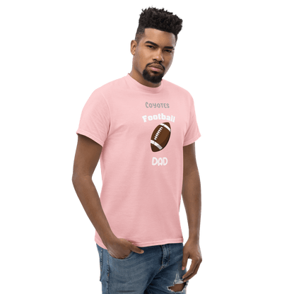 Personalized pink football dad tee with Coyotes graphic for proud supporters and fans.